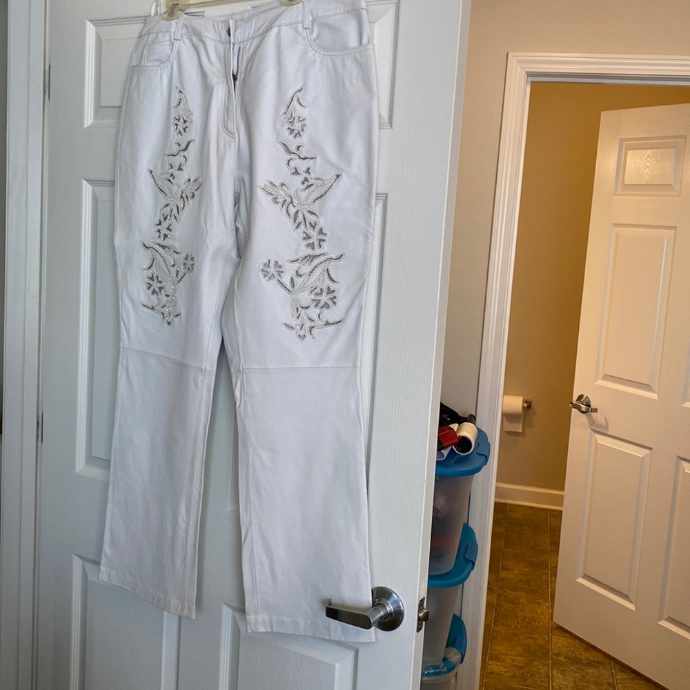 Women’s soft leather pants -white with design on legs. Size plus 18